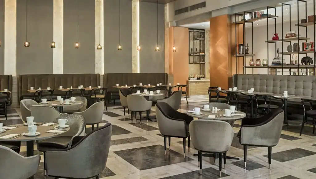 Luxurious restaurant with cozy seating and contemporary design, perfect for dining and gatherings.